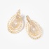 Long oval earrings with yellow diamonds