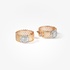 Modern bold pink gold hoops with diamond centre