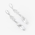 Fine modern white gold earrings with white topaz and diamonds