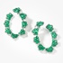 White gold side hoops with emerald flowers and diamonds