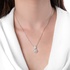 White gold double ornament necklace with diamonds