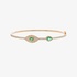 Gold evil eye bracelet with emeralds and diamonds