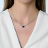 Diamond tennis necklace with a sapphire heart