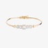 Gold bangle bracelet with baguette diamonds