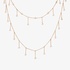 Pink gold double chain necklace with hanging diamonds