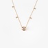 Gold oval shape pendant with pink sapphire
