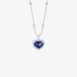 Fine sapphire heart pendant with a diamond outline and a diamond heart