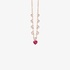 Pink gold dangling necklace with a ruby heart