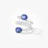 White gold spiral ring with  sapphire ends