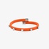 Orange rubber bracelet with small flower motifs