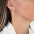 Long gold geometric earrings with diamonds
