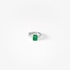 Single white gold hoop with emerald