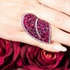 Purple titanium ring with rubies