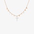pink gold necklace with dangling crosses