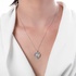 multi-layered heart pendant with diamonds