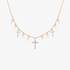 Pink and white gold necklace with multiple crosses hanging