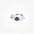 White gold solitaire sapphire ring with diamonds