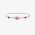 Gold evil eye bangle bracelet with rubies and diamonds
