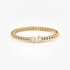 Gold bangle with two single stones in the end