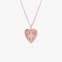 Pink gold heart shaped pendant with diamonds