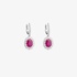 Dangling white gold diamond earrings with ruby rosettes
