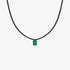 Black diamond tennis necklace with a hanging emerald