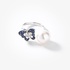 White gold ring with a pearl and a sapphire butterfly