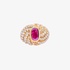 gold ring with diamonds and an oval cut ruby