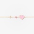 Gold bracelet with a pink enamel heart