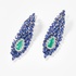 Long white gold earrings with sapphires and an emerald drop