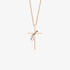 Thin pink gold cross with a hoop around it