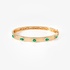 Gold bangle with oval and pear shape emeralds