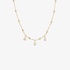 Discreet gold chain necklace with three dangling diamonds