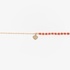 Gold chain bracelet with coral beads