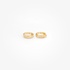 Tiny gold hoops with diamonds