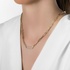 Modern gold necklace with diamond details