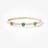 Gold bangle bracelet with diamonds and emerald hearts