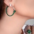 Thin emerald hoops with diamonds