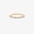 Pink gold half band ring with baguette diamonds