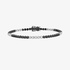 Tennis bracelet with black and white diamonds