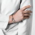 Bangle bracelet in white gold with diamonds