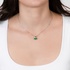 White gold pendant with small pear emeralds and diamonds