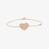 Gold bangle bracelet with a heart