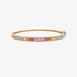 Thin gold bangle bracelet with rainbow colored sapphires and diamonds