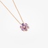 Pink gold flower pendant with purple sapphires
