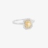 White gold rectangular ring with diamonds and a yellow diamond center