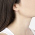 Long pink gold earrings with poire cut diamonds
