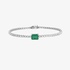 Tennis bracelet with emerald centre