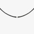 black diamond tennis necklace with a single brilliant diamond at the center