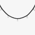 Fine tennis necklace with black diamonds and dangling pear cut diamonds